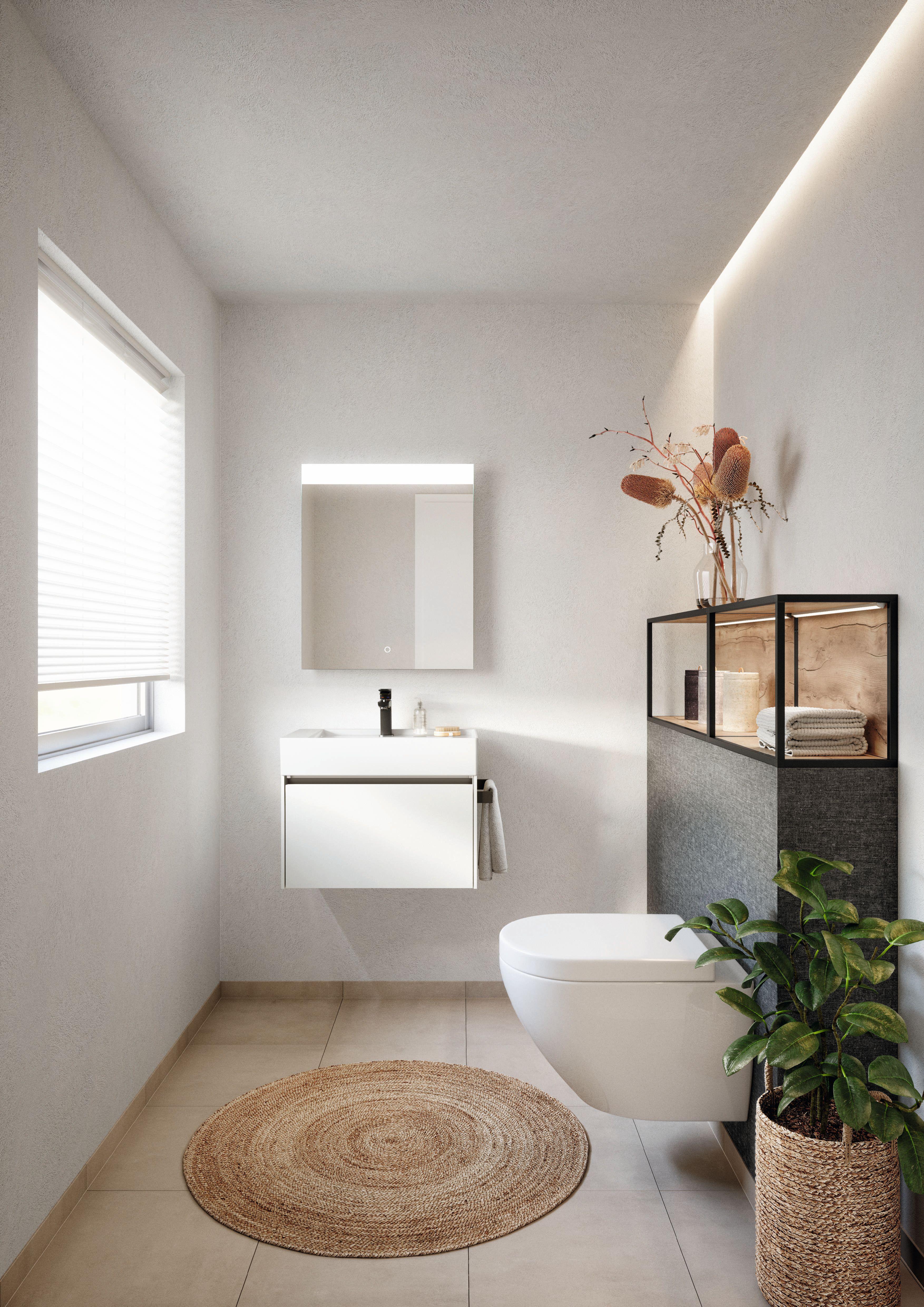 Modern eingerichtetes Gäste-WC mit platzsparendem Waschtischunterschrank, wandhängendem WC und stilvoller Dekoration.